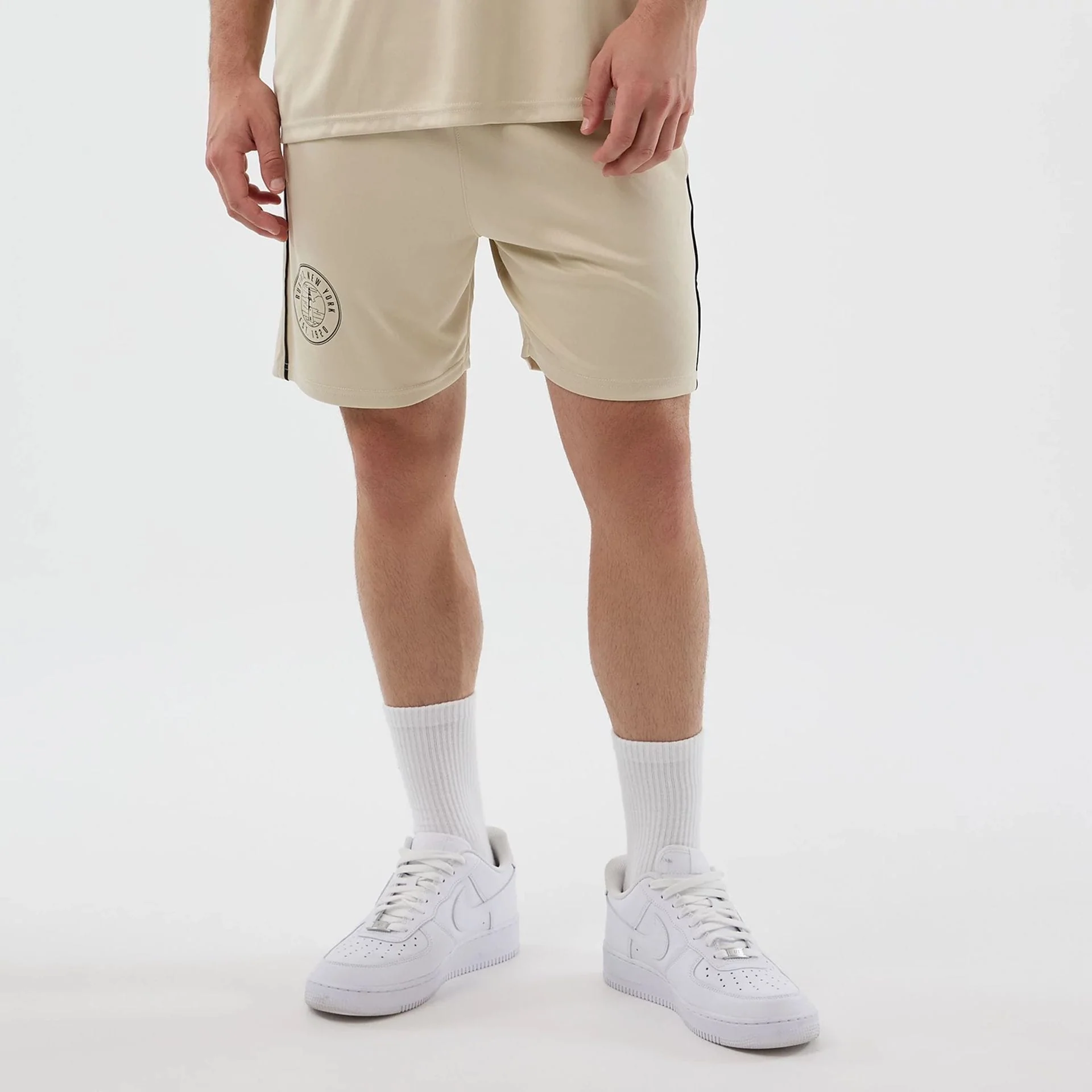 15431-new-era-football-light-beige-shorts-1.webp New Era Football Light Beige Shorts