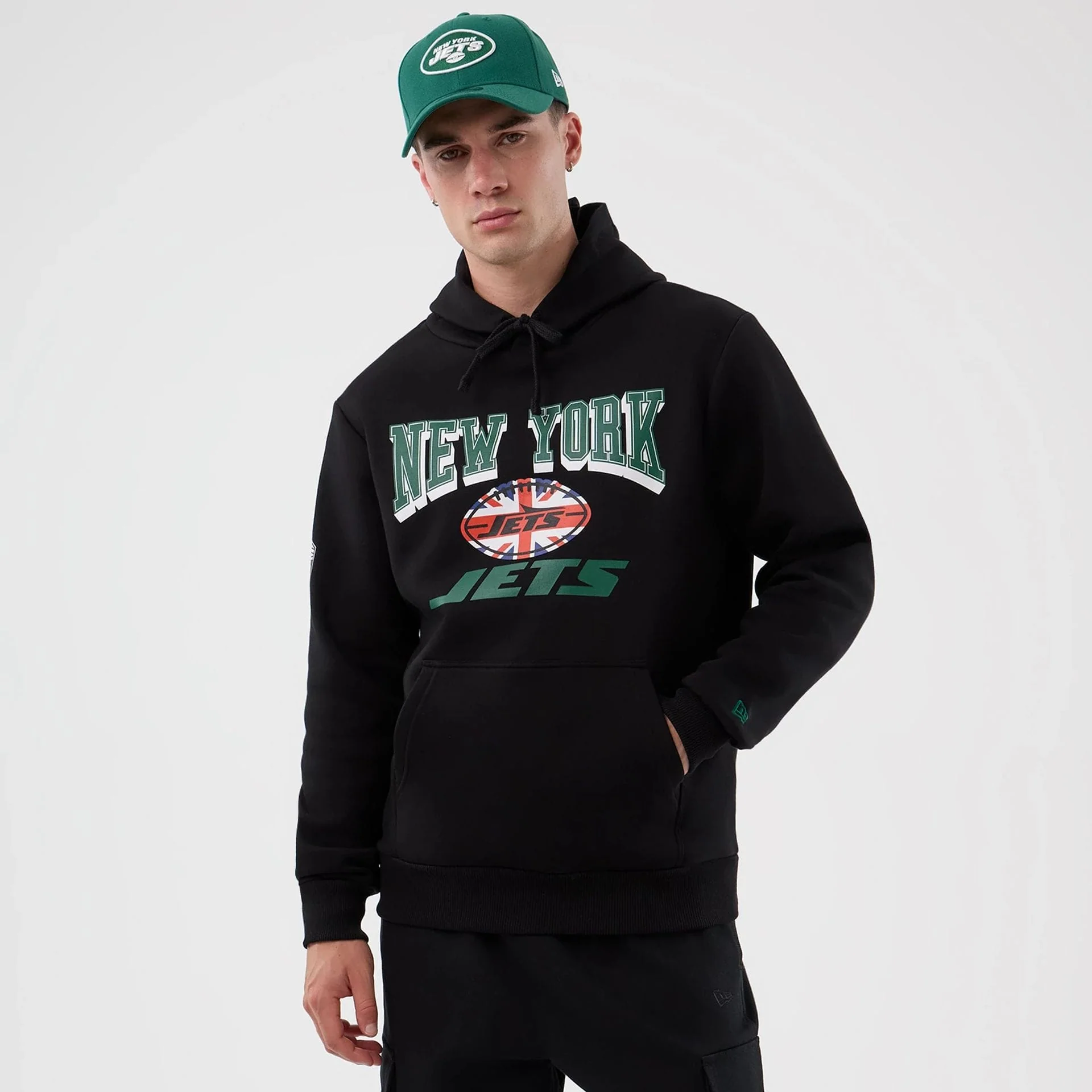 9682-new-york-jets-nfl-international-series-games-black-pullover-hoodie-1.webp New York Jets NFL International Series Games Black Pullover Hoodie
